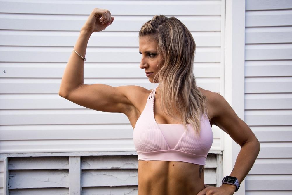 woman flexing her biceps